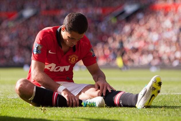 Javier Hernandez of Manchester United sits looking dejected following a failed chance on goal - Manchester United vs. West Bromwich Albion - Barclay s Premier League - Old Trafford - Manchester - 28 09 2013 Pic Philip Oldham Sportimage EDITORIAL USE ONLY. No use with unauthorised audio, video, data, fixture lists, club league logos or live services. Online in-match use limited to 120 images, no video emulation. No use in betting, games or single club league player publications.