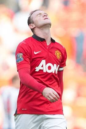 Wayne Rooney of Manchester United looks dejected - Manchester United vs. West Bromwich Albion - Barclay s Premier League - Old Trafford - Manchester - 28 09 2013 Pic Philip Oldham Sportimage EDITORIAL USE ONLY. No use with unauthorised audio, video, data, fixture lists, club league logos or live services. Online in-match use limited to 120 images, no video emulation. No use in betting, games or single club league player publications.
