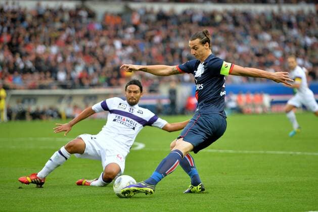Zlatan Ibrahimovic (psg) - Abel Aguilar (tou) FOOTBALL : FC Paris Saint Germain vs FC Toulouse - Ligue 1 - 28 09 2013 AnthonyBIBARD FEP Panoramic 