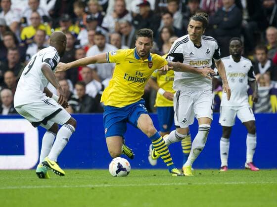 Football - 2013 2014 Premier League - Swansea City vs. Arsenal olivier giroud at the Liberty Stadium. COLORSPORT WINSTON BYNORTH 