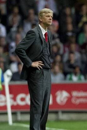 Football - 2013 2014 Premier League - Swansea City vs. Arsenal arsene wenger on the touchlineat the Liberty Stadium. COLORSPORT WINSTON BYNORTH