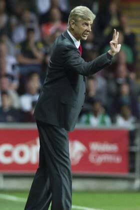 Football - 2013 2014 Premier League - Swansea City vs. Arsenal arsene wenger on the touchlineat the Liberty Stadium. COLORSPORT WINSTON BYNORTH