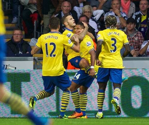 PROPAGANDA20130928 Football - soccer: Barclays Premier League, Swansea City FC - Arsenal FC, Arsenal s Serge Gnabry celebrates scoring the first goal against Swansea City during the Premiership match at the Liberty Stadium. (Hinweis: Verwendung nur in Deutschland, Österreich oder Schweiz - only Germany, Austria and Switzerland) xHOCHxZWEIx xPropagandax 