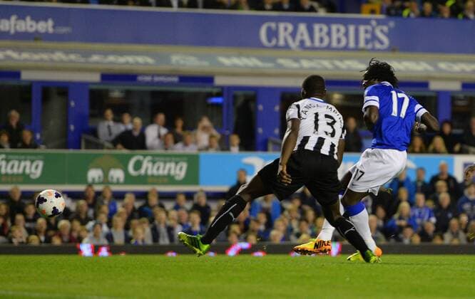 Romelu Lukaku of Everton scores the first goal on his home debut - Barclays Premier League - Everton vs Newcastle Utd - Goodison Park Stadium - Liverpool - England - 30 09 13 - Picture Simon Bellis Sportimage EDITORIAL USE ONLY. No use with unauthorised audio, video, data, fixture lists, club league logos or live services. Online in-match use limited to 120 images, no video emulation. No use in betting, games or single club league player publications.