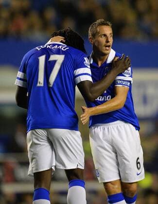 Phil Jagielka of Everton (R) talks to Romelu Lukaku of Everton on his debut - Barclays Premier League - Everton vs Newcastle Utd - Goodison Park Stadium - Liverpool - England - 30 09 13 - Picture Simon Bellis Sportimage EDITORIAL USE ONLY. No use with unauthorised audio, video, data, fixture lists, club league logos or live services. Online in-match use limited to 120 images, no video emulation. No use in betting, games or single club league player publications.