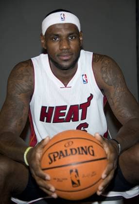 Miami Heat s LeBron James (6) poses for a photo during the team s media day at the American Airlines Arena in Miami, Florida on September 30, 2013.  MIA20130930136