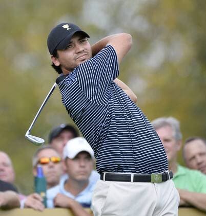 International Team member Jason Day of Australia tees off on the third hole during the second round foursome competition against the United States Team at the 2013 Presidents Cup at Muirfield Village Golf Club in Dublin, Ohio on October 4, 2013.  BKX2013100419