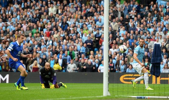 Alvaro Negredo of Manchester City scores the equalising goal past Tim Howard of Everton - Barclays Premier League - Manchester City vs Everton - Etihad Stadium - Manchester - England - 05 10 13 - Picture Simon Bellis Sportimage EDITORIAL USE ONLY. No use with unauthorised audio, video, data, fixture lists, club league logos or live services. Online in-match use limited to 120 images, no video emulation. No use in betting, games or single club league player publications.