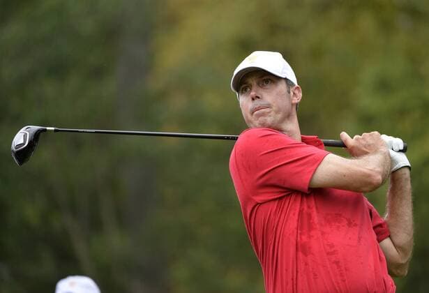 United States Team member Matt Kuchar tees off on the ninth hole during the third round four-ball competition against the International Team at the 2013 Presidents Cup at Muirfield Village Golf Club in Dublin, Ohio on October 5, 2013.  BKX2013100553