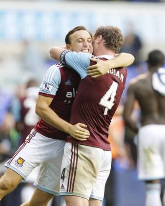 West Ham s Mark Noble celebrates with Kevin Nolan at the final whistle Tottenham Hotspur - West Ham United - Premier League - White Hart Lane - London - England -06 10 2013 - xDavidxKleinx EDITORIAL USE ONLY. No use with unauthorised audio, video, data, fixture lists, club league logos or live services. Online in-match use limited to 120 images, no video emulation. No use in betting, games or single club league player publications.
