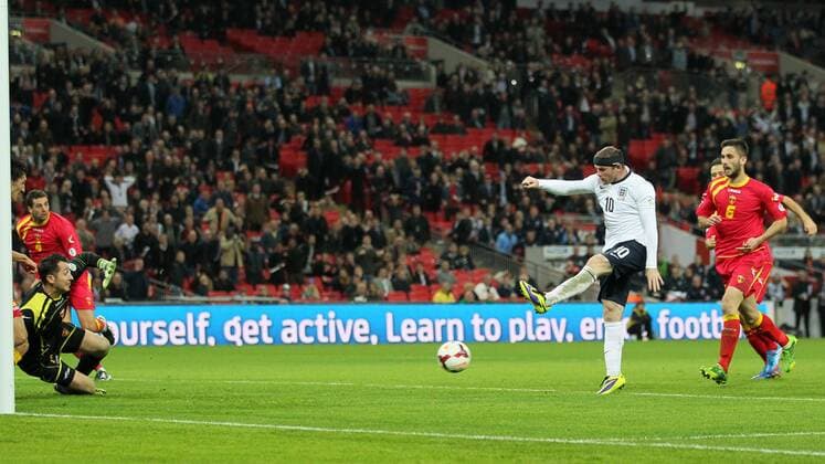 England s Wayne Rooney scoring his sides opening goal England v Montenegro - World Cup Qualifier - London - Wembley - England -11 10 2013 - Pic David Klein Sportimage EDITORIAL USE ONLY. No use with unauthorised audio, video, data, fixture lists, club league logos or live services. Online in-match use limited to 120 images, no video emulation. No use in betting, games or single club league player publications.