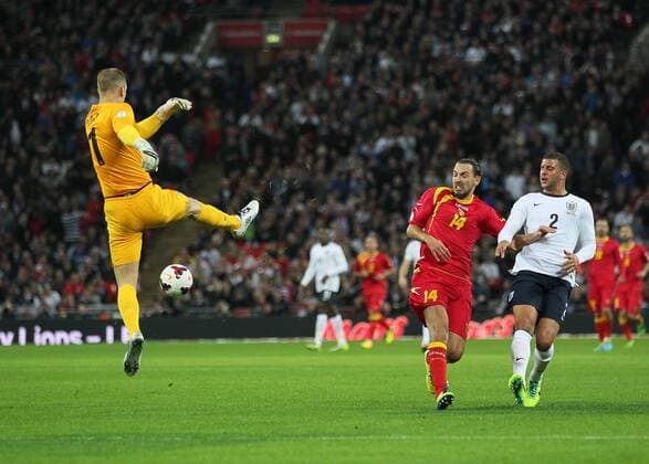 England s Joe Hart fails to clear the ball properly England v Montenegro - World Cup Qualifier - London - Wembley - England -11 10 2013 - Pic David Klein Sportimage EDITORIAL USE ONLY. No use with unauthorised audio, video, data, fixture lists, club league logos or live services. Online in-match use limited to 120 images, no video emulation. No use in betting, games or single club league player publications.