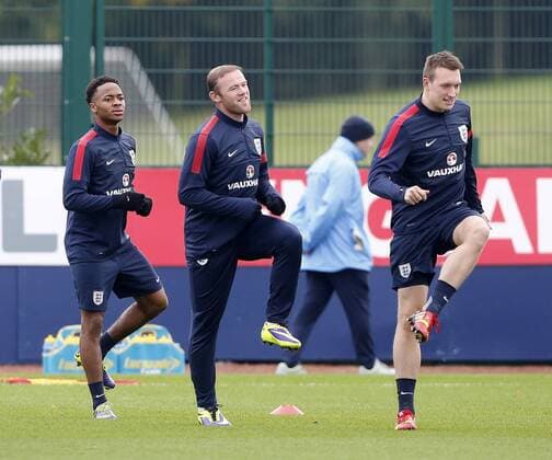 England s Raheem Sterling, Wayne Rooney and Phil Jones during training England Training - World Cup Qualifier - London - England -14 10 2013 - Pic David Klein Sportimage EDITORIAL USE ONLY. No use with unauthorised audio, video, data, fixture lists, club league logos or live services. Online in-match use limited to 120 images, no video emulation. No use in betting, games or single club league player publications.