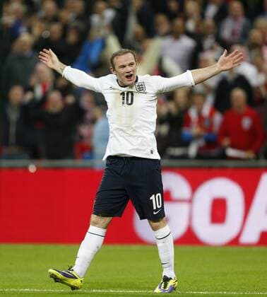 England s Wayne Rooney celebrates scoring his sides opening goal England v Poland - 2014 World Cup Qualifier - Wembley - London - England -15 10 2013 - Pic David Klein Sportimage EDITORIAL USE ONLY. No use with unauthorised audio, video, data, fixture lists, club league logos or live services. Online in-match use limited to 120 images, no video emulation. No use in betting, games or single club league player publications.