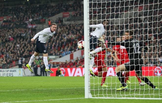 England s Wayne Rooney scoring his sides opening goal England v Poland - 2014 World Cup Qualifier - Wembley - London - England -15 10 2013 - Pic David Klein Sportimage EDITORIAL USE ONLY. No use with unauthorised audio, video, data, fixture lists, club league logos or live services. Online in-match use limited to 120 images, no video emulation. No use in betting, games or single club league player publications.