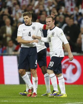 England s Wayne Rooney celebrates scoring his sides opening goal England v Poland - 2014 World Cup Qualifier - Wembley - London - England -15 10 2013 - Pic David Klein Sportimage EDITORIAL USE ONLY. No use with unauthorised audio, video, data, fixture lists, club league logos or live services. Online in-match use limited to 120 images, no video emulation. No use in betting, games or single club league player publications.