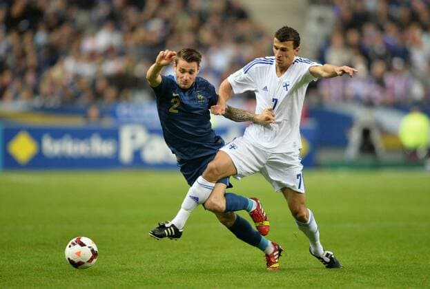 Mathieu Debuchy (fra) - Roman Eremenko (fin) FOOTBALL : France vs Finlande - qualifications Coupe du monde 2014 - 15 10 2013 AnthonyBIBARD FEP Panoramic 
