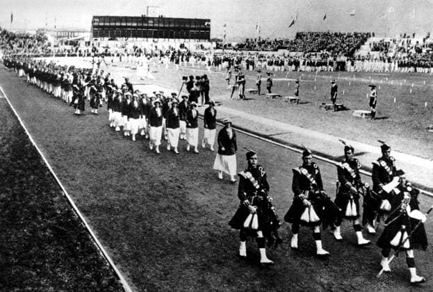Olympic Games 1924, Paris France. The British contingent at the opening of the Olympic Games are headed by the pipers of the Cameron Highlanders and women competitors in navy and white. kbdig 2000 quer tocs 