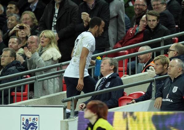 England v Poland - World Cup Qualifier . . Wembley, London, UK . . 15.10.2013 Andros Townsend (E) walks past Roy Hodgson (England manager) after being substituted in the second half.