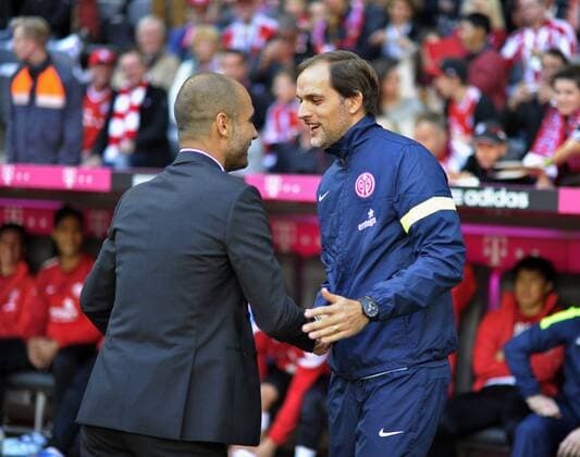 19.10.2013, Fussball 1.Bundesliga 2013 2014, 9.Spieltag, FC Bayern München - 1.FSV Mainz 05, in der Allianz-Arena München. v.li: Shakehands Trainer Pep Guardiola (Bayern München) mit Trainer Thomas Tuchel (Mainz).