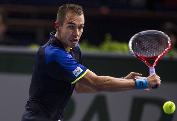 PARIS, Oct. 2013 - Lucas Rosol of the Czech Republic returns a shot during the first round of the BNP Paribas 2013 Masters Tennis tournament in Paris, France, on Oct. 29, 2013. Rosol won 2-0. (Xinhua Etienne Laurent) (SP)FRANCE-PARIS-ATP-MASTERS TENNIS 