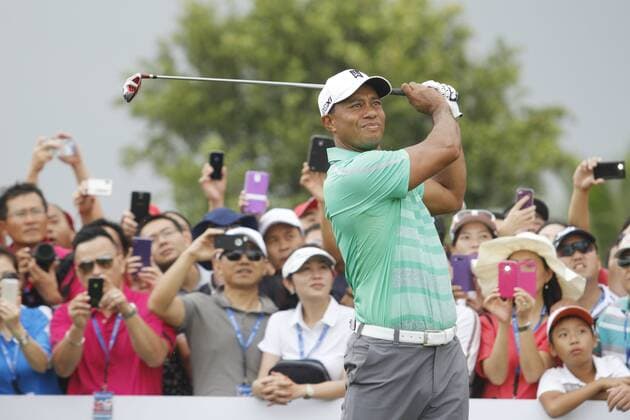 Tiger Woods of the United States plays a shot during The Match at Mission Hills in Haikou city, south Chinas Hainan province, 28 October 2013.  pau902585_01