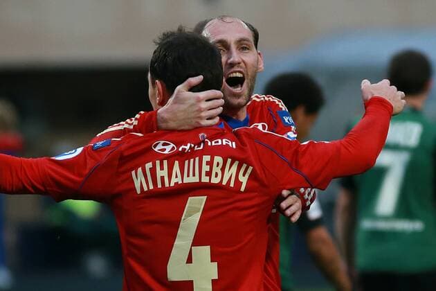 October 27, 2013. Russia, Moscow, Eduard Streltsov Stadium. Russian football Premier League 2013 14. CSKA s players Sergei Ignashevich, Elvir Rahimic during round 14 tournament match between PFC CSKA (Moscow) and FC Krasnodar (Krasnodar) DmitryxGolubovich 