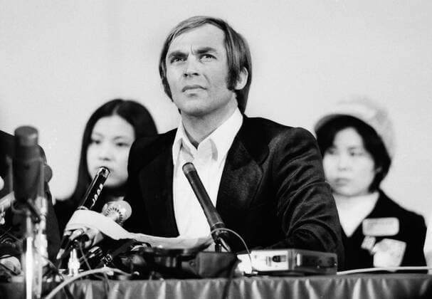 Alpine Skiing - 1972 Sapporo Winter Olympics - Karl Schranz Disqualification Press Conference Austrian skier Karl Schranz faces the world s media at the press conference in which International Olympic Committee President Avery Brundage announces his disqualified from the Sapporo Games for breaching the Olympic amateur eligibility code by allowing his name and photograph to be used for advertising purposes . Schranz, the 1969 and 1970 overall World Cup champion, was the most celebrated, and highly paid, skier of the time. He did not deny the accusation but contended that he was being punished for a crime that all athletes of the day were guilty of: It s an emphasis on the wrong principle. I think the Olympics should be a contest for all sportsman with no regard of colour, race, or wealth. The entire Austrian team threatened to boycott in solidarity, and on flying home to Vien 