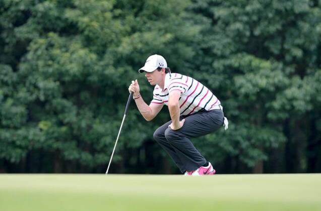Rory McIlroy of Northern Ireland considers a shot during the first round of the HSBC Champions golf tournament at the Sheshan International Golf Club in Shanghai, China, 31 October 2013. After struggling all year since changing clubs to Nike, former world number one Rory McIlroy left a field containing 40 of the worlds top 50 in his wake as he shot a seven-under par round of 65 to lead the WGC-HSBC Champions in Shanghai by two shots Thursday (31 October 2013). But he cautioned against getting carried away by a performance at which he outshone in-form playing partner and recent US PGA Golf Herren Champion Jason Dufner by eight shots. McIlroy fired seven birdies in his first 11 holes, and eight in all. He had just one bogey at the tough par-four 11th, his second hole. More importantly he looked like the McIlroy of a year ago who won the money lists on both sides of the Atlantic and soar  20131031_04937