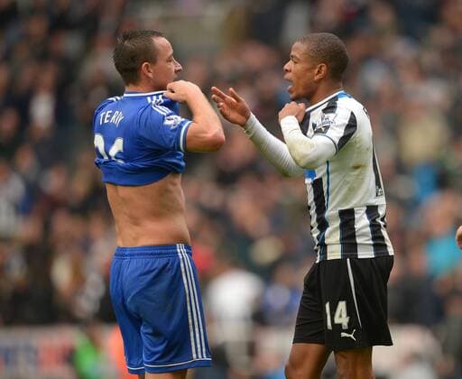 John Terry of Chelsea gives up his shirt to Loic Remy of Newcastle United - Barclays Premier League - Newcastle Utd vs Chelsea - St James Park Stadium - Newcastle - England - 02 11 13 - Picture Simon Bellis Sportimage EDITORIAL USE ONLY. No use with unauthorised audio, video, data, fixture lists, club league logos or live services. Online in-match use limited to 120 images, no video emulation. No use in betting, games or single club league player publications.