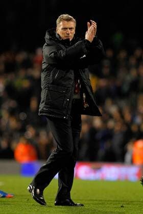 Football - 2013 2014 Premier League - Fulham vs. Manchester United Manchester United Manager David Moyes applauds the traveling support after his sides win at Craven Cottage Colorsport Shaun Boggust 
