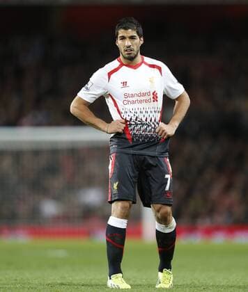 Liverpool s Luis Suarez looks on dejected Arsenal v Liverpool - Barclays Premier League - Emirates Stadium - London - England -02 11 2013 - Pic David Klein Sportimage EDITORIAL USE ONLY. No use with unauthorised audio, video, data, fixture lists, club league logos or live services. Online in-match use limited to 120 images, no video emulation. No use in betting, games or single club league player publications.