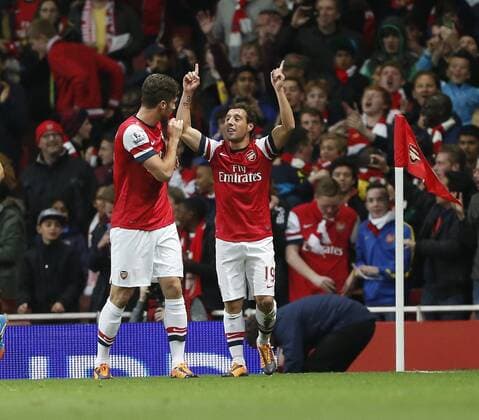 Arsenal s Santi Cazorla celebrates scoring his sides opening goal Arsenal v Liverpool - Barclays Premier League - Emirates Stadium - London - England -02 11 2013 - Pic David Klein Sportimage EDITORIAL USE ONLY. No use with unauthorised audio, video, data, fixture lists, club league logos or live services. Online in-match use limited to 120 images, no video emulation. No use in betting, games or single club league player publications.