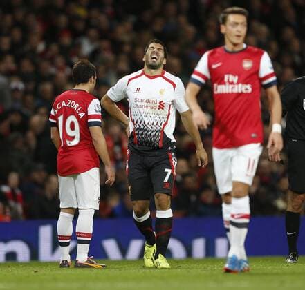 Liverpool s Luis Suarez looks on dejected Arsenal v Liverpool - Barclays Premier League - Emirates Stadium - London - England -02 11 2013 - Pic David Klein Sportimage EDITORIAL USE ONLY. No use with unauthorised audio, video, data, fixture lists, club league logos or live services. Online in-match use limited to 120 images, no video emulation. No use in betting, games or single club league player publications.