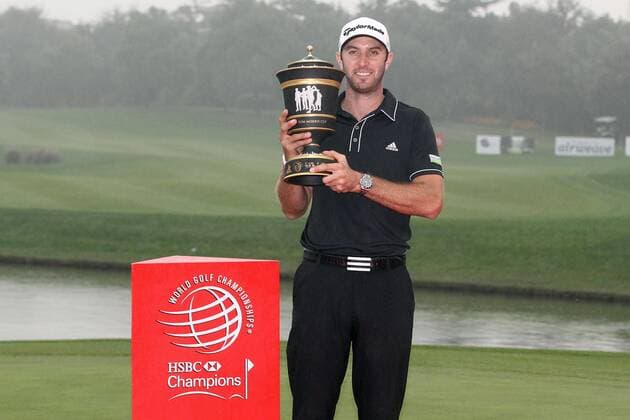 Golfer Dustin Johnson of the United States poses with his champion trophy during the award ceremony of the HSBC Champions golf tournament in Shanghai, China, 3 November 2013. American golfer Dustin Johnson won the champion of the HSBC Champions golf tournament at the Sheshan International Golf Club in Shanghai, China, 3 Nov 2013. Against all the other contenders, Johnson pulled away with power and a clutch putt to win his first World Golf Championship in Shanghai. Dustin Johnson wins championship of HSBC Champions golf tournament in Shanghai  pau905496_02