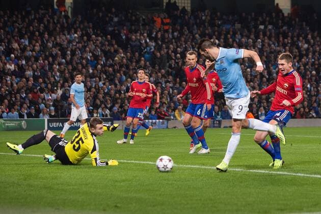 Alvaro Negredo of Manchester City scores his sides third goal - Manchester City vs. CSKA Moscow - UEFA Champions League - Etihad Stadium - Manchester - 05 11 2013 EDITORIAL USE ONLY. No use with unauthorised audio, video, data, fixture lists, club league logos or live services. Online in-match use limited to 120 images, no video emulation. No use in betting, games or single club league player publications.