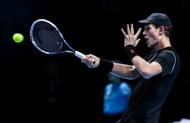 Tomas Berdych of Czech Republic hits a return during the Singles Group A match on day 3 of the Barclays ATP Tennis Herren World Tour Finals at the O2 Arena in London, Britain, Nov. 6, 2013. Berdych won 2-0. (Xinhua Tang Shi) (SP)BRITAIN-LONDON-TENNIS-ATP FINALS-DAY 3- 