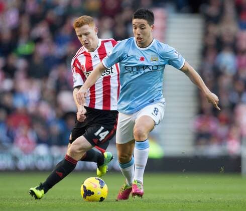 Jack Colback of Sunderland and Samir Nasri of Manchester City - Sunderland vs. Manchester City - Barclay s Premier League - Stadium of Light - Sunderland - 10 11 2013 Pic Philip Oldham Sportimage EDITORIAL USE ONLY. No use with unauthorised audio, video, data, fixture lists, club league logos or live services. Online in-match use limited to 120 images, no video emulation. No use in betting, games or single club league player publications.