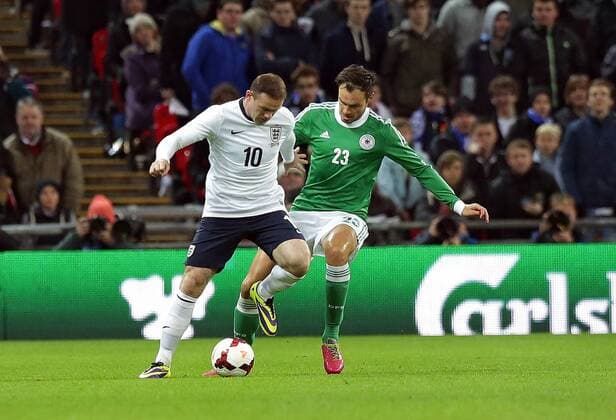 19.11.2013, xovx, Fussball Freundschaftsspiel England - Deutschland, v.l. Wayne Rooney (England), Heiko Westermann (Deutschland), Aktion.