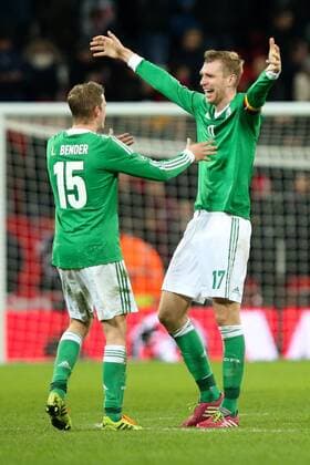 Germany s goalscorer and captain Per Mertesacker celebrates the victory with Germany s Lars Bender - England v Germany - International Friendly - Wembley Stadium - London - 19th November 2013 - Pic Charlie Forgham-Bailey Sportimage EDITORIAL USE ONLY. No use with unauthorised audio, video, data, fixture lists, club league logos or live services. Online in-match use limited to 120 images, no video emulation. No use in betting, games or single club league player publications.