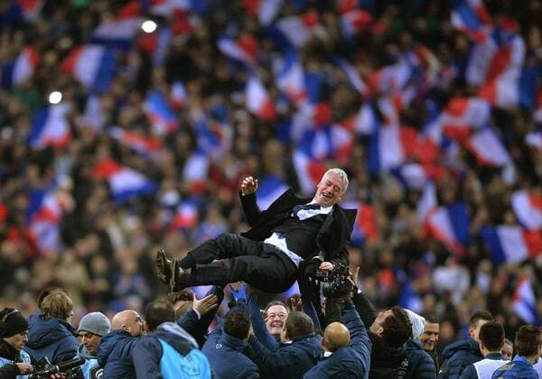 PARIS, Nov. 19, 2013 (Xinhua) -- Coach Didier Deschamps (above) is tossed by members of team France after the 2014 World Cup qualifying second leg playoff soccer match between France and Ukraine in Paris, France, on Nov. 19, 2013. France won 3-2 in total to be qualified for the final stage of the 2014 World Cup. (Xinhua Chen Xiaowei) (SP)FRANCE-PARIS-SOCCER-WC QUALIFICATIONS-FRANCE VS. UKRAINE 
