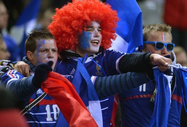 PARIS, Nov. 19, 2013 - Fans of team France pose for group photos before the World Cup qualifying second leg playoff soccer match in Paris, France, on Nov. 19, 2013. (SP)PARIS-SOCCER-WC QUALIFICATIONS- 