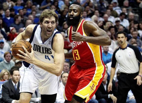 Nov. 20, 2012 - Dallas, TX, USA - Dallas Mavericks power forward Dirk Nowitzki (41) drives past Houston Rockets shooting guard James Harden (13) at the American Airlines Center in Dallas on Wednesday, Nov. 20, 2013. Rockets at Mavericks - ZUMAm67