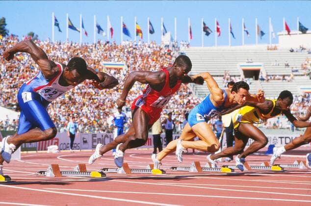 Athletics - 1987 IAAF Rome World Championships - Men s 100m Heats Canada s Ben Johnson (red) and Great Britain s Linford Christie, left, at the Stadio Olimpico. 29 08 1987 