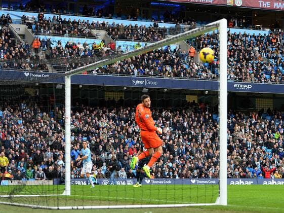 Jesus Navas of Manchester City scores the first goal - Barclays Premier League - Manchester City vs Tottenham Hotspur - Etihad Stadium - Manchester - England - 24th November 2013 - EDITORIAL USE ONLY. No use with unauthorised audio, video, data, fixture lists, club league logos or live services. Online in-match use limited to 120 images, no video emulation. No use in betting, games or single club league player publications.