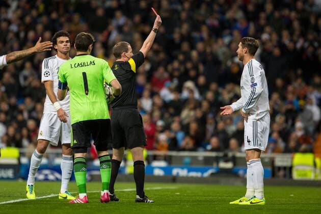 MADRID, ESPANA - 27 DE NOVIEMBRE 2013: referee William Collum - Sergio Ramos Real Madrid - Galatasaray Istanbul Estadio Santiago Bernabeu (Photo:SergioLopez Cordonpress) 