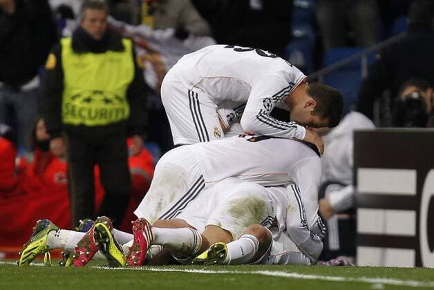 Soccer match between Real Madrid and Galatasaray Istanbul of the Champions League, held at the Santiago Bernabeu stadium, in Madrid 11 27 2013. Players celebrate after scoring 
