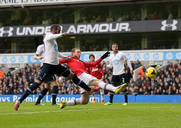 Manchester United s Wayne Rooney scoring his sides opening goal Tottenham Hotspur v Manchester United (ManU) - Premier League - White Hart Lane - London - 01 12 2013 - EDITORIAL USE ONLY. No use with unauthorised audio, video, data, fixture lists, club league logos or live services. Online in-match use limited to 120 images, no video emulation. No use in betting, games or single club league player publications.