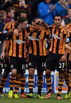 Jake Livermore of Hull City (c) celebrates scoring the first goal - Barclays Premier League - Hull City vs Liverpool - Kingston Communications Stadium - Hull - England - 1st December 2013 - Picture Simon Bellis Sportimage EDITORIAL USE ONLY. No use with unauthorised audio, video, data, fixture lists, club league logos or live services. Online in-match use limited to 120 images, no video emulation. No use in betting, games or single club league player publications.