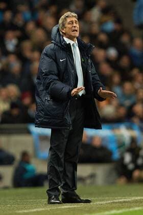 Manuel Pellegrini, manager of Manchester City reacts during the first half - Manchester City vs. Swansea City - Barclays Premier League - Etihad Stadium - Manchester - 01 12 2013 Pic Philip Oldham Sportimage EDITORIAL USE ONLY. No use with unauthorised audio, video, data, fixture lists, club league logos or live services. Online in-match use limited to 120 images, no video emulation. No use in betting, games or single club league player publications.